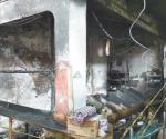 Incendia mujer local comercial