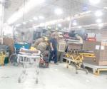Queda obrero atrapado en una prensa industrial